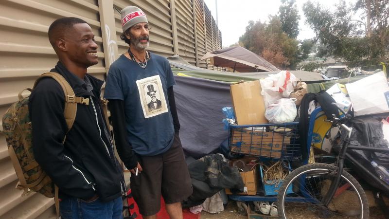 Jesse Henderson (left), an Army veteran, walks Hollywood Boulevard in Los Angeles looking for homeless veterans. His job is to try and connect them with support resources, including transitional housing, offered by the nonprofit U.S.Vets. Jesse Henderson (left), an Army veteran, walks Hollywood Boulevard in Los Angeles looking for homeless veterans. His job is to try and connect them with support resources, including transitional housing, offered by the nonprofit U.S.Vets.