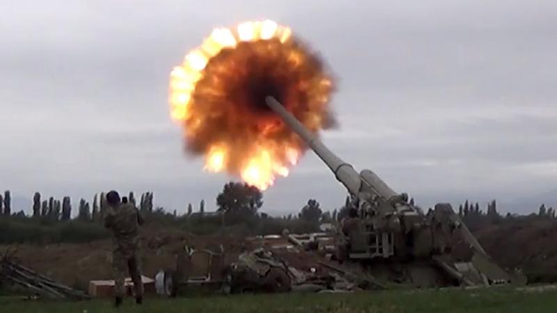 A howitzer fires munitions toward Armenian positions Monday. Violence between Armenia and Azerbaijan erupted Sunday in the disputed region of Nagorno-Karabakh. A howitzer fires munitions toward Armenian positions Monday. Violence between Armenia and Azerbaijan erupted Sunday in the disputed region of Nagorno-Karabakh.