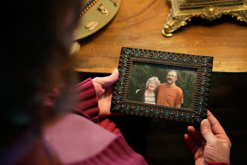 Greta Horner holds a photo of her and her husband Ed taken a few months before he died. Greta Horner holds a photo of her and her husband Ed taken a few months before he died.