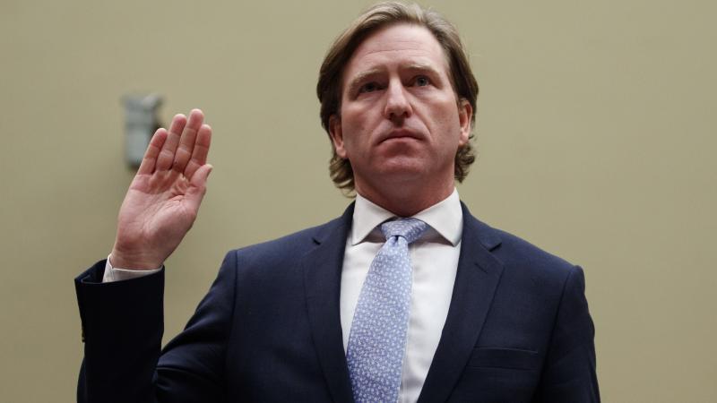 Christopher Krebs, recently ousted as director of the Department of Homeland Security's Cybersecurity and Infrastructure Security Agency, is sworn in to testify last year on Capitol Hill. Christopher Krebs, recently ousted as director of the Department of Homeland Security's Cybersecurity and Infrastructure Security Agency, is sworn in to testify last year on Capitol Hill.