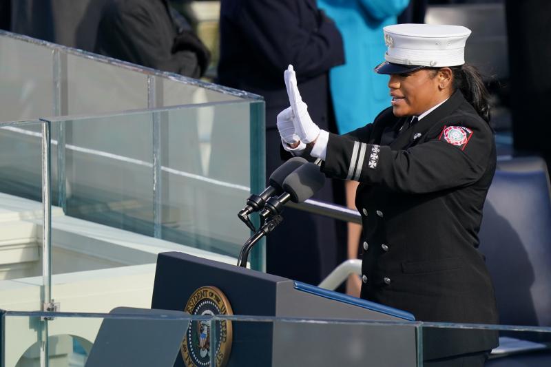 Capt. Andrea Hall, a firefighter from Fulton County, Ga., delivers the pledge of allegiance during the 59th Presidential Inauguration on Wednesday. Capt. Andrea Hall, a firefighter from Fulton County, Ga., delivers the pledge of allegiance during the 59th Presidential Inauguration on Wednesday.