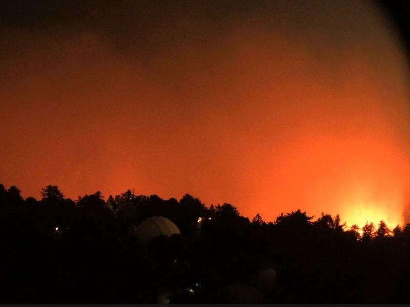 A view facing east from the Mount Wilson Observatory near Los Angeles shows the nearby flames of the Bobcat Fire early Wednesday. A view facing east from the Mount Wilson Observatory near Los Angeles shows the nearby flames of the Bobcat Fire early Wednesday.