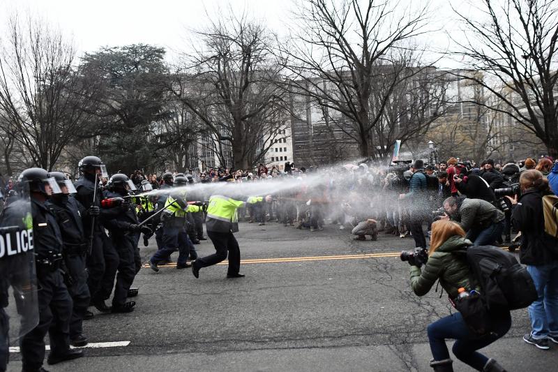 Police and protesters face off on Jan. 20 in Washington, D.C., during President Trump's inauguration. More than 200 people were arrested and charged with rioting. Jury selection began Wednesday, and opening statements in the first trials are set to begin Police and protesters face off on Jan. 20 in Washington, D.C., during President Trump's inauguration. More than 200 people were arrested and charged with rioting. Jury selection began Wednesday, and opening statements in the first trials are set to begin