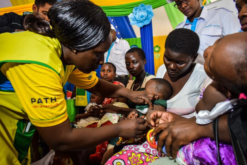 A health worker vaccinates a Kenyan child with the world's first malaria vaccine. Kenya has given at least one dose to 300,000 children so far. A health worker vaccinates a Kenyan child with the world's first malaria vaccine. Kenya has given at least one dose to 300,000 children so far.