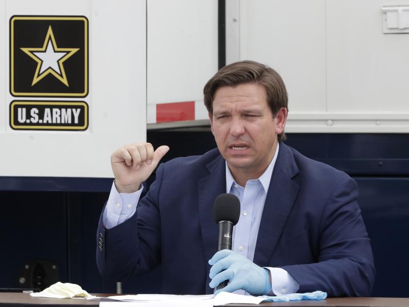 Florida Gov. Ron DeSantis speaks during a news conference in front of a U.S. Army Corps of Engineers mobile command center at the Miami Beach Convention Center last week. DeSantis says he wants to ramp up testing at the state's long-term care facilities. Florida Gov. Ron DeSantis speaks during a news conference in front of a U.S. Army Corps of Engineers mobile command center at the Miami Beach Convention Center last week. DeSantis says he wants to ramp up testing at the state's long-term care facilities.