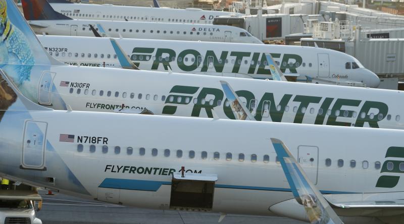 Frontier Airlines jetliners sit at gates on the A concourse at Denver International Airport. Lawsuits filed on Tuesday accuse the airline of discriminating against pregnant and nursing women. Frontier Airlines jetliners sit at gates on the A concourse at Denver International Airport. Lawsuits filed on Tuesday accuse the airline of discriminating against pregnant and nursing women.