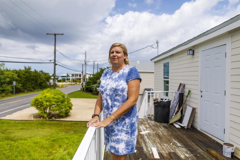 When buying her new home in Big Pine Key, Fla., Amy Tripp closed early, just before federal flood insurance rates rose by thousands of dollars. Her rate will still go up more slowly over time. When buying her new home in Big Pine Key, Fla., Amy Tripp closed early, just before federal flood insurance rates rose by thousands of dollars. Her rate will still go up more slowly over time.