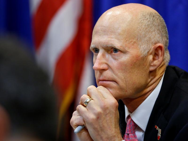 Florida Gov. Rick Scott wants a range of measures aimed at preventing shootings like the one last week at a high school in Parkland, Fla. Scott is seen here during a meeting with law enforcement, mental health and education officials on Tuesday. Florida Gov. Rick Scott wants a range of measures aimed at preventing shootings like the one last week at a high school in Parkland, Fla. Scott is seen here during a meeting with law enforcement, mental health and education officials on Tuesday.