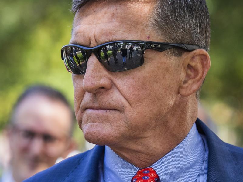 Michael Flynn, President Trump's former national security adviser, leaves federal court following a status conference with U.S. District Judge Emmet Sullivan in Washington in September. Michael Flynn, President Trump's former national security adviser, leaves federal court following a status conference with U.S. District Judge Emmet Sullivan in Washington in September.