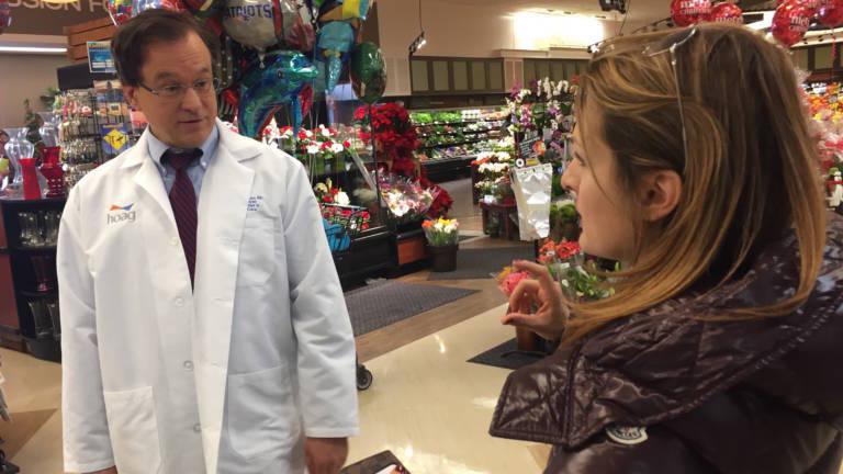 Dr. Daniel Nadeau gives Allison Scott tips on getting kids to eat healthy at Ralph's Supermarket in Huntington Beach, Calif. Dr. Daniel Nadeau gives Allison Scott tips on getting kids to eat healthy at Ralph's Supermarket in Huntington Beach, Calif.