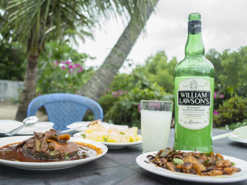 At Nettoor Toddy Shop, fresh toddy from nearby coconut orchards is served in up-cycled wine, vodka or scotch bottles. At Nettoor Toddy Shop, fresh toddy from nearby coconut orchards is served in up-cycled wine, vodka or scotch bottles.