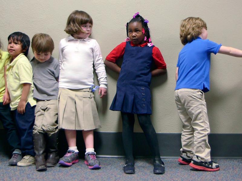 Preschool students from Nikki Jones's class at Porter Early Childhood Development Center in Tulsa line up in the hallway on their way back from outside play. Preschool students from Nikki Jones's class at Porter Early Childhood Development Center in Tulsa line up in the hallway on their way back from outside play.