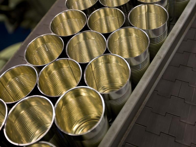 Cans are lined up at the Pacific Coast Producers plant in Oroville, Calif. The company, which cans fruits for sale in supermarkets, says new tariffs imposed by the Trump administration on steel imports will eat into its profits. Cans are lined up at the Pacific Coast Producers plant in Oroville, Calif. The company, which cans fruits for sale in supermarkets, says new tariffs imposed by the Trump administration on steel imports will eat into its profits.