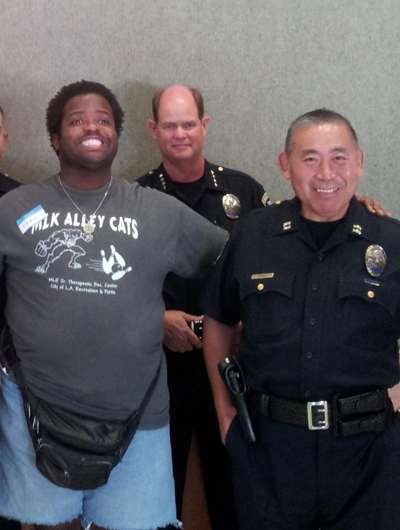 Chris Akubuilo meets members of the Culver City, Calif., police department. Akubuilo has autism, and his mother is worried about his safety when he interacts with police. Chris Akubuilo meets members of the Culver City, Calif., police department. Akubuilo has autism, and his mother is worried about his safety when he interacts with police.