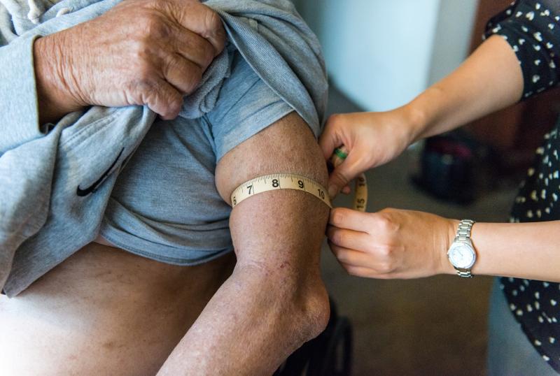 At Gerald Chinchar's home in San Diego, Calif., Nurse Sheri Juan (right) checks his arm for edema that might be a sign that his congestive heart failure is getting worse. At Gerald Chinchar's home in San Diego, Calif., Nurse Sheri Juan (right) checks his arm for edema that might be a sign that his congestive heart failure is getting worse.
