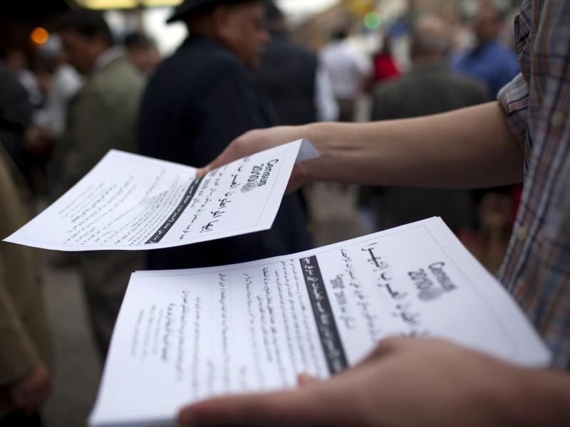 Worshippers exiting a mosque in the Bay Ridge neighborhood of Brooklyn, N.Y., are handed fliers encouraging participation in the 2010 census. Worshippers exiting a mosque in the Bay Ridge neighborhood of Brooklyn, N.Y., are handed fliers encouraging participation in the 2010 census.