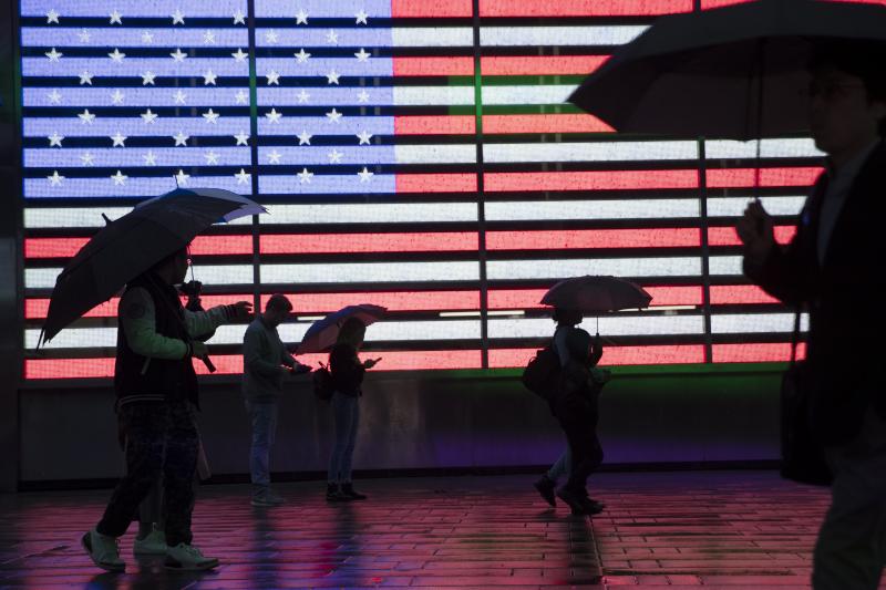 People holding umbrellas walk through New York City's Times Square in 2019. The U.S. Census Bureau plans to change how it protects the confidentiality of people's information in the detailed demographic data it produces through the 2020 count. People holding umbrellas walk through New York City's Times Square in 2019. The U.S. Census Bureau plans to change how it protects the confidentiality of people's information in the detailed demographic data it produces through the 2020 count.