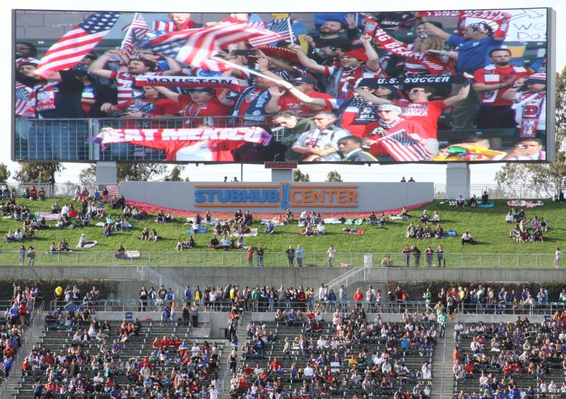 American Outlaws, seen on the big screen, cheer for the U.S. women's national team more than half an hour before kickoff during a match with Mexico on May 17. American Outlaws, seen on the big screen, cheer for the U.S. women's national team more than half an hour before kickoff during a match with Mexico on May 17.