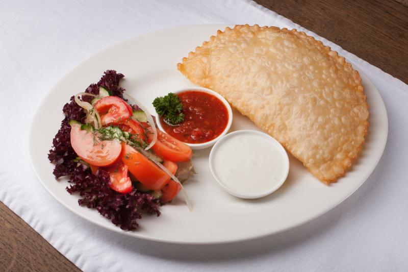 Cheburek, a thin, deep-fried pocket of cheese, meat or mushrooms are a best seller at Musafir. The Tatar restaurant has become an asylum-seeker of sorts in Kiev, the Ukrainian capital, in the wake of Russia's annexation of Crimea. Cheburek, a thin, deep-fried pocket of cheese, meat or mushrooms are a best seller at Musafir. The Tatar restaurant has become an asylum-seeker of sorts in Kiev, the Ukrainian capital, in the wake of Russia's annexation of Crimea.