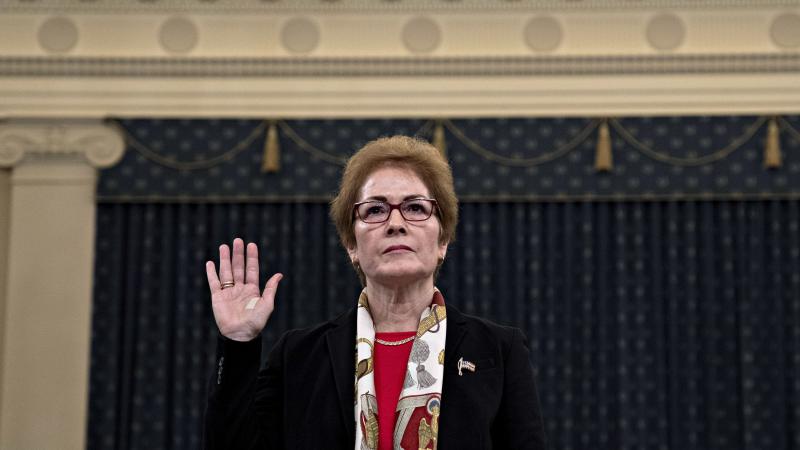 Marie Yovanovitch is sworn in on Nov. 15, 2019, prior to providing testimony as part of the inquiry that led to President Donald Trump's first impeachment. Yovanovitch served as the U.S. ambassador to Ukraine but was relieved of her post following a smear Marie Yovanovitch is sworn in on Nov. 15, 2019, prior to providing testimony as part of the inquiry that led to President Donald Trump's first impeachment. Yovanovitch served as the U.S. ambassador to Ukraine but was relieved of her post following a smear