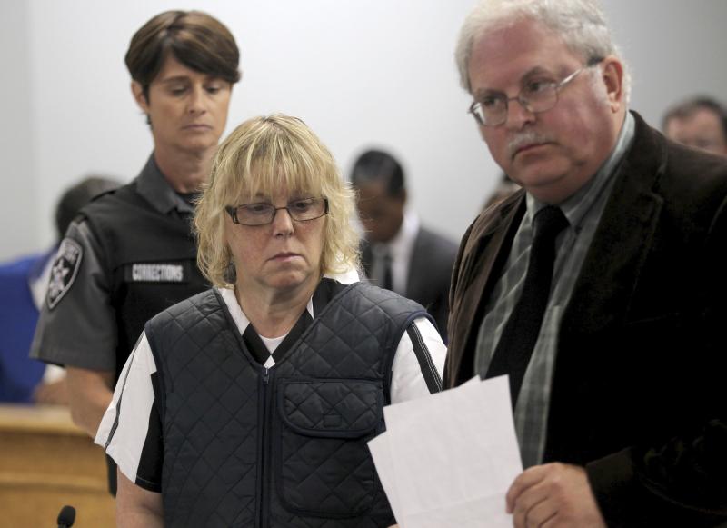 Joyce Mitchell, who has reached a plea deal over charges that she aided a prison escape, is seen here during a June court date, along with her lawyer, Steven Johnston. Joyce Mitchell, who has reached a plea deal over charges that she aided a prison escape, is seen here during a June court date, along with her lawyer, Steven Johnston.