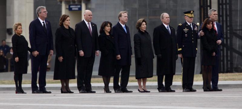 Former President George W. Bush (far right) and his wife, Laura Bush (second from right) Former President George W. Bush (far right) and his wife, Laura Bush (second from right)