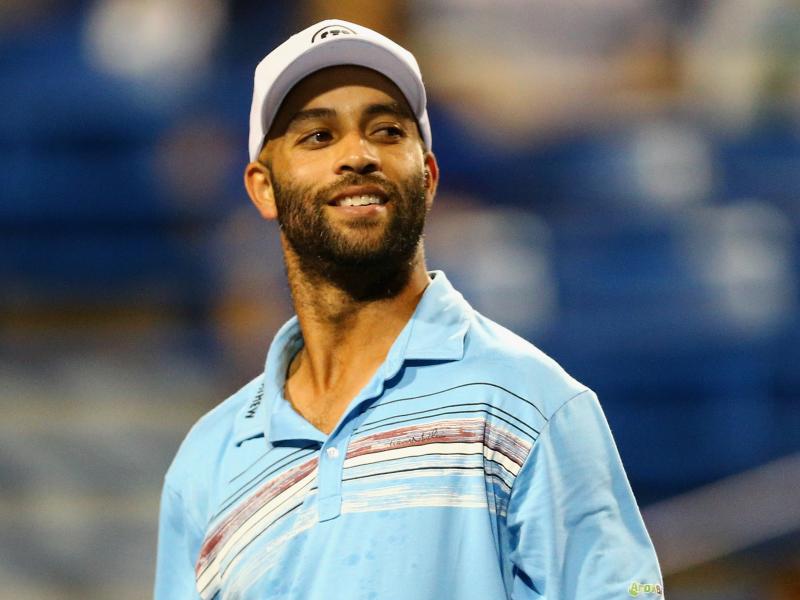 In this Aug. 27 photo, retired tennis player James Blake looks on during a "legends" match against Andy Roddick. In this Aug. 27 photo, retired tennis player James Blake looks on during a "legends" match against Andy Roddick.