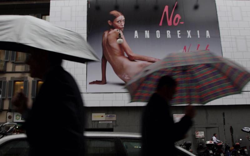 A Pedestrian walks past a Nolita advertisement during Spring/Summer fashion week on Sept. 26, 2007 in Milan, Italy. Isabelle Caro, 27, was photographed for Flash & Partners' Italian clothing company's label Nolita. The company said they are running a camp A Pedestrian walks past a Nolita advertisement during Spring/Summer fashion week on Sept. 26, 2007 in Milan, Italy. Isabelle Caro, 27, was photographed for Flash & Partners' Italian clothing company's label Nolita. The company said they are running a camp