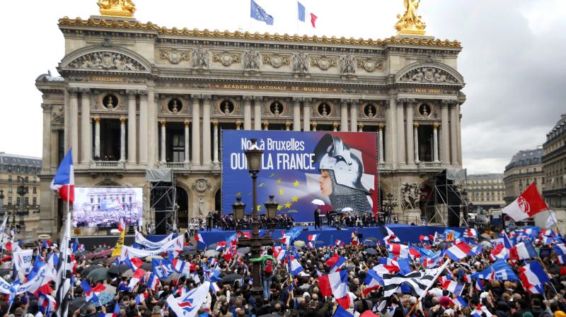 Hundreds of supporters of France's far-right National Front political party attend the party's annual May Day rally in front of the Paris Opera on Thursday. Hundreds of supporters of France's far-right National Front political party attend the party's annual May Day rally in front of the Paris Opera on Thursday.