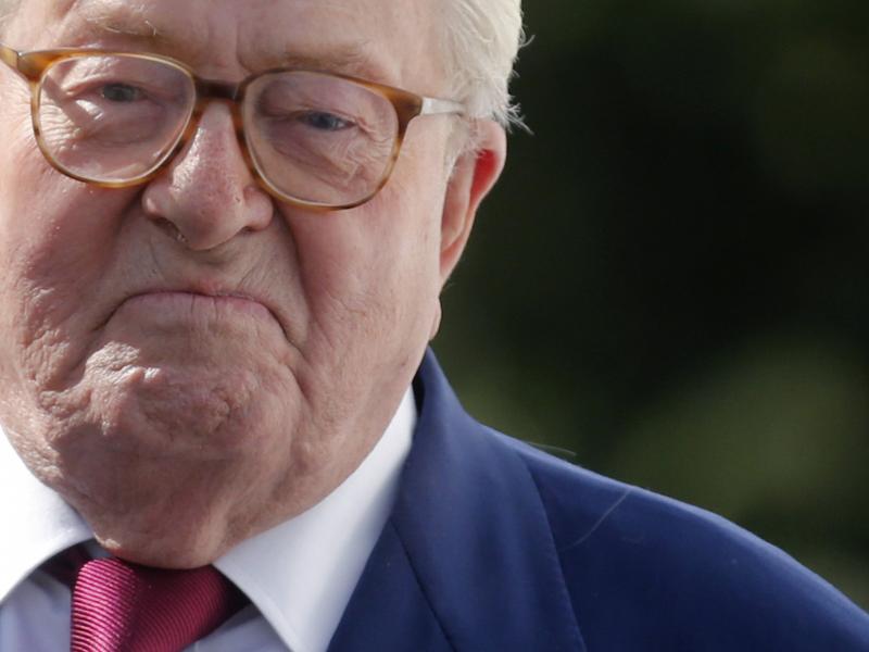 French far-right National Front founder Jean-Marie Le Pen arrives for a news briefing at party headquarters in Nanterre, near Paris, on Thursday. The executive committee decided to expel Le Pen from the party over remarks downplaying the Holocaust. French far-right National Front founder Jean-Marie Le Pen arrives for a news briefing at party headquarters in Nanterre, near Paris, on Thursday. The executive committee decided to expel Le Pen from the party over remarks downplaying the Holocaust.