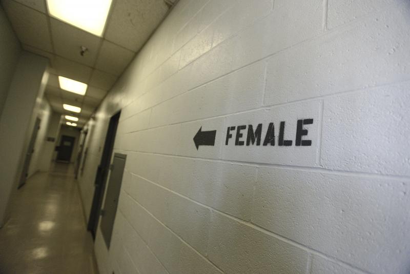 A sign points toward the women's section of the Huntington Beach jail. The National Council for Incarcerated and Formerly Incarcerated Women and Girls is appealing to President Biden to grant clemency to 100 women during his first 100 days in office. A sign points toward the women's section of the Huntington Beach jail. The National Council for Incarcerated and Formerly Incarcerated Women and Girls is appealing to President Biden to grant clemency to 100 women during his first 100 days in office.