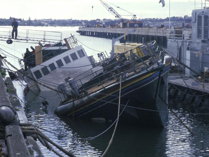 The Greenpeace vessel Rainbow Warrior after an underwater explosion in Auckland, New Zealand, in July 1985. The Greenpeace vessel Rainbow Warrior after an underwater explosion in Auckland, New Zealand, in July 1985.