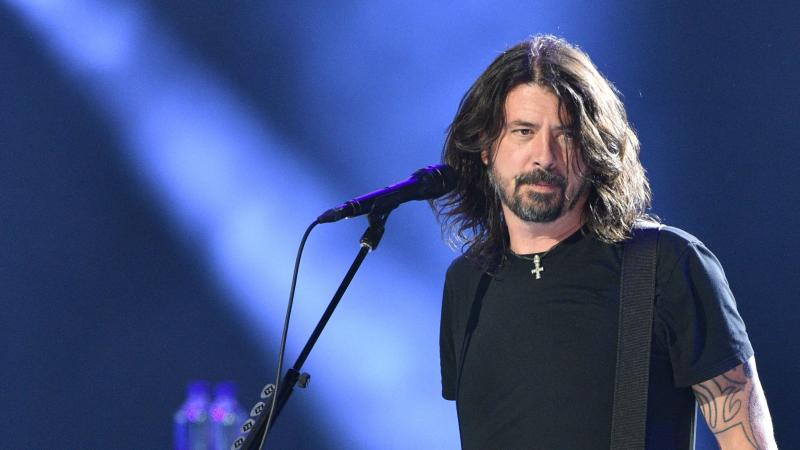 Dave Grohl performs onstage during the taping of the 2021 "Vax Live" fundraising concert at the in Inglewood, Calif. Dave Grohl performs onstage during the taping of the 2021 "Vax Live" fundraising concert at the in Inglewood, Calif.