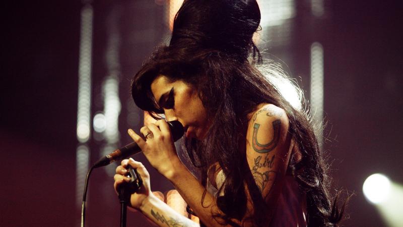 Amy Winehouse performs at London's Music of Black Origin Awards in 2007. Amy Winehouse performs at London's Music of Black Origin Awards in 2007.