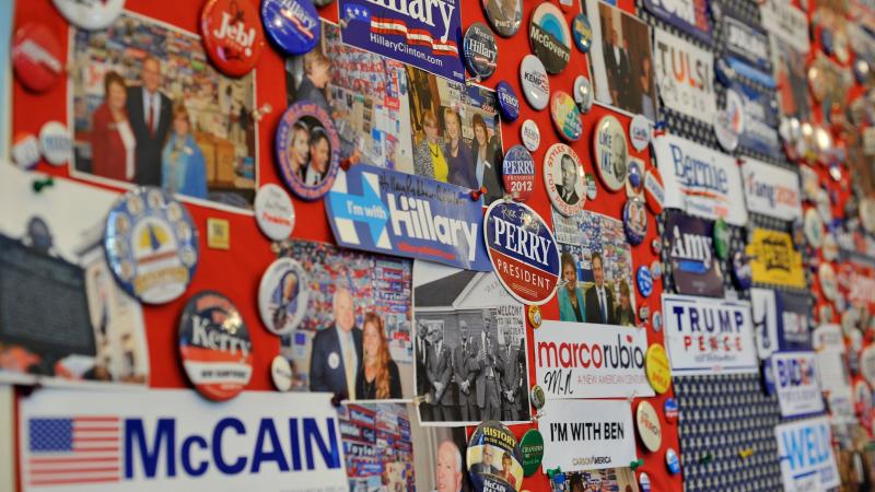 A collection of current and past presidential advertising materials hangs on a wall in the visitor center of the New Hampshire State House in Concord, N.H. A collection of current and past presidential advertising materials hangs on a wall in the visitor center of the New Hampshire State House in Concord, N.H.