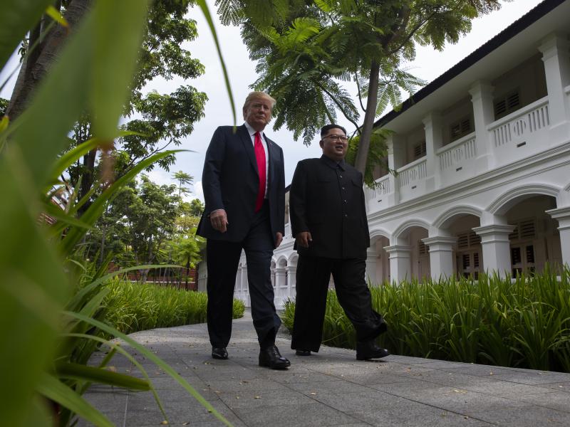 President Trump walks with North Korean leader Kim Jong Un on Tuesday on Sentosa Island in Singapore. President Trump walks with North Korean leader Kim Jong Un on Tuesday on Sentosa Island in Singapore.