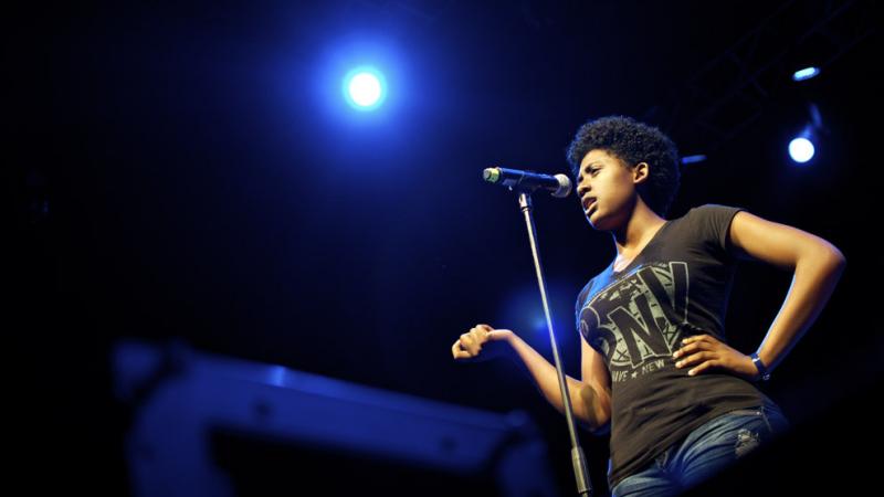 Daisy Armstrong began performing poetry when her mother took her to a youth poetry group. Soon, she was winning competitions — but she was also kicked out of school after a slam poetry tour. Daisy Armstrong began performing poetry when her mother took her to a youth poetry group. Soon, she was winning competitions — but she was also kicked out of school after a slam poetry tour.