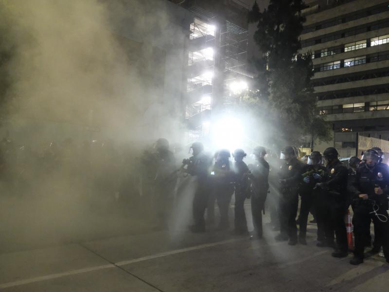 Police officers fire rubber bullets May 29 during a Los Angeles protest over the death of George Floyd. Police officers fire rubber bullets May 29 during a Los Angeles protest over the death of George Floyd.