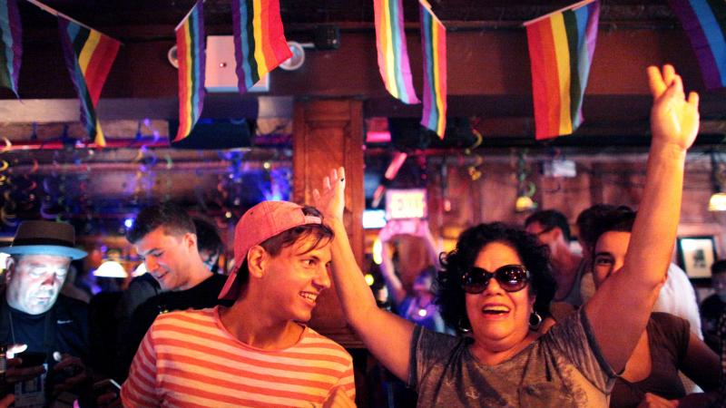 People celebrate inside the Stonewall Inn, an iconic gay bar recently granted historic landmark status, after the U.S. Supreme Court ruled same-sex couples have the right to marry in all 50 states. People celebrate inside the Stonewall Inn, an iconic gay bar recently granted historic landmark status, after the U.S. Supreme Court ruled same-sex couples have the right to marry in all 50 states.