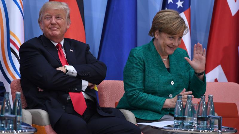 Despite President Trump's decision to withdraw from an international climate accord, other leaders affirmed their commitment to the plan at the G20 Summit. Trump is seen here with German Chancellor Angela Merkel on Saturday. Despite President Trump's decision to withdraw from an international climate accord, other leaders affirmed their commitment to the plan at the G20 Summit. Trump is seen here with German Chancellor Angela Merkel on Saturday.