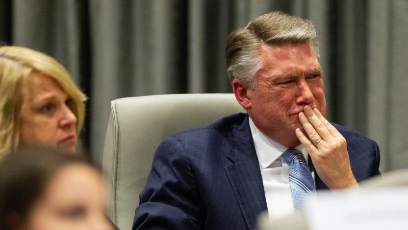 Mark Harris, Republican candidate in North Carolina's 9th Congressional race, fights back tears at the conclusion of his son John Harris's testimony during the third day of a North Carolina State Board of Elections hearing on the 9th Congressional Distric Mark Harris, Republican candidate in North Carolina's 9th Congressional race, fights back tears at the conclusion of his son John Harris's testimony during the third day of a North Carolina State Board of Elections hearing on the 9th Congressional Distric