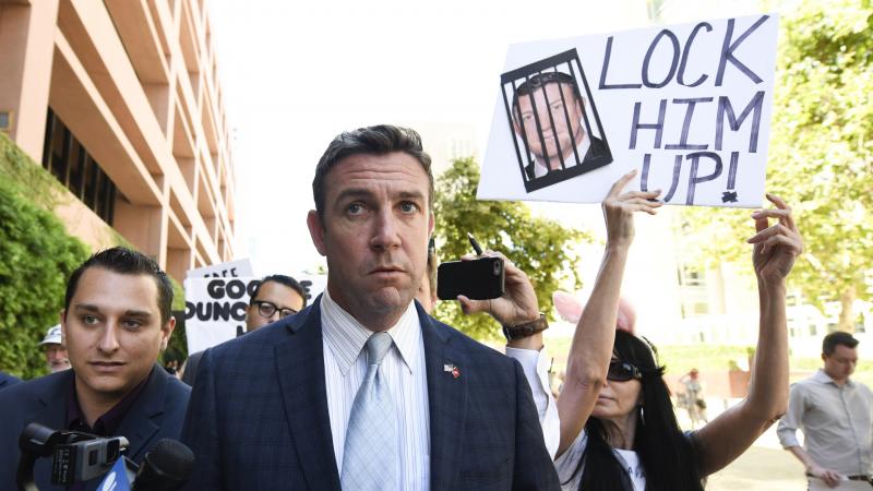 Rep. Duncan Hunter, R-Calif., leaves federal court after a hearing in San Diego in July. Rep. Duncan Hunter, R-Calif., leaves federal court after a hearing in San Diego in July.