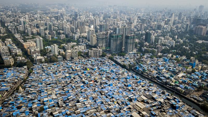 In Mumbai, some prosperous neighborhoods sit alongside slums. This year's Gates report on progress toward eliminating poverty notes that there is vast inequality not only between nations, but within many of them. In Mumbai, some prosperous neighborhoods sit alongside slums. This year's Gates report on progress toward eliminating poverty notes that there is vast inequality not only between nations, but within many of them.