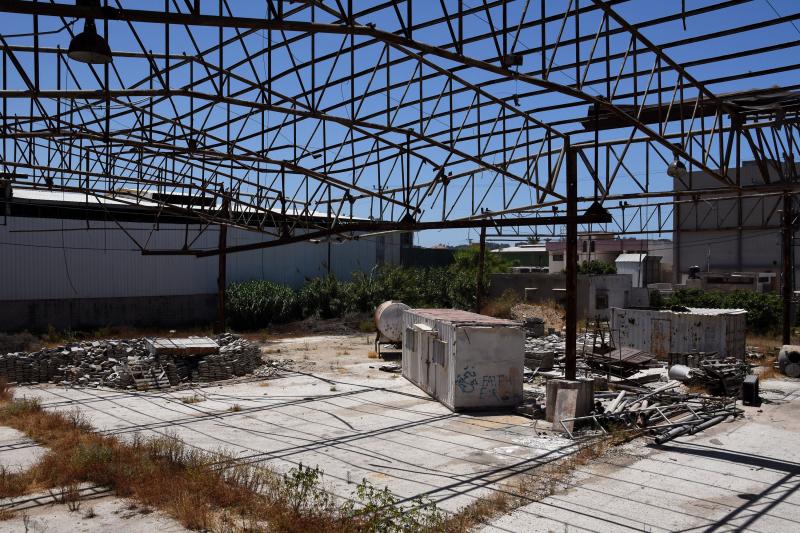 Faysal Shawa's warehouse was damaged in the 2014 conflict. Shawa and employees maintain no connection to Hamas. Faysal Shawa's warehouse was damaged in the 2014 conflict. Shawa and employees maintain no connection to Hamas.
