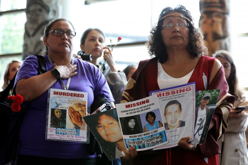Women attend the closing ceremony of the National Inquiry into Missing and Murdered Indigenous Women and Girls on Monday in Gatineau, Quebec. Women attend the closing ceremony of the National Inquiry into Missing and Murdered Indigenous Women and Girls on Monday in Gatineau, Quebec.