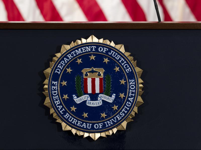 The FBI seal photographed in 2018. On Tuesday, federal prosecutors arrested and charged a 20-year-old woman in Georgia with conspiring to provide material support to ISIS, which carries a maximum prison sentence of 20 years. The FBI seal photographed in 2018. On Tuesday, federal prosecutors arrested and charged a 20-year-old woman in Georgia with conspiring to provide material support to ISIS, which carries a maximum prison sentence of 20 years.