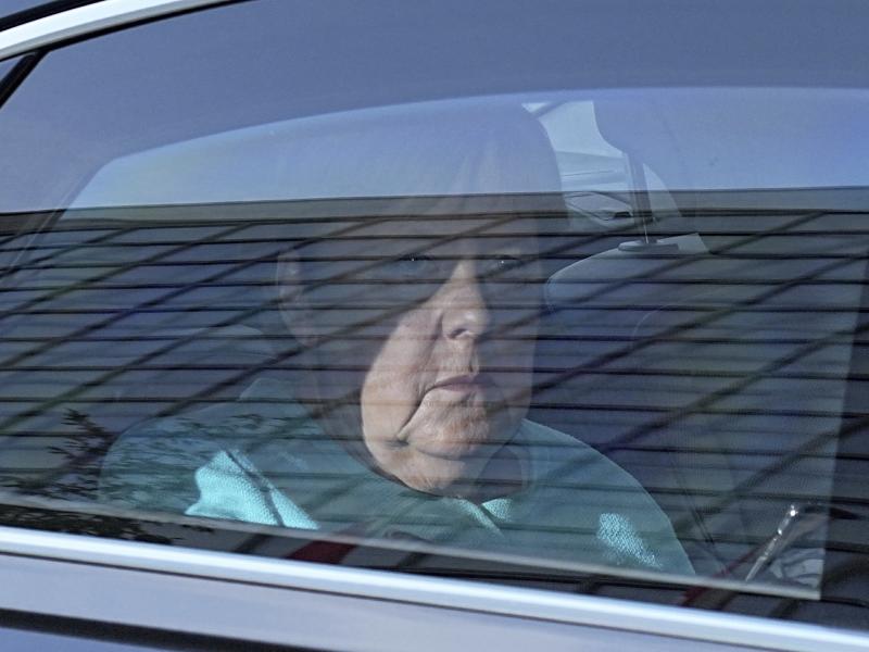 German Chancellor Angela Merkel arrives at the Konrad Adenauer House in Berlin, Germany, Sunday, Sept. 26, 2021. German voters are choosing a new parliament in an election that will determine who succeeds Chancellor Angela Merkel after her 16 years at the German Chancellor Angela Merkel arrives at the Konrad Adenauer House in Berlin, Germany, Sunday, Sept. 26, 2021. German voters are choosing a new parliament in an election that will determine who succeeds Chancellor Angela Merkel after her 16 years at the