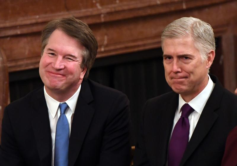 Supreme Court Justices Brett Kavanaugh (left) and Neil Gorsuch attend the Presidential Medal of Freedom ceremony at the White House last year. Supreme Court Justices Brett Kavanaugh (left) and Neil Gorsuch attend the Presidential Medal of Freedom ceremony at the White House last year.