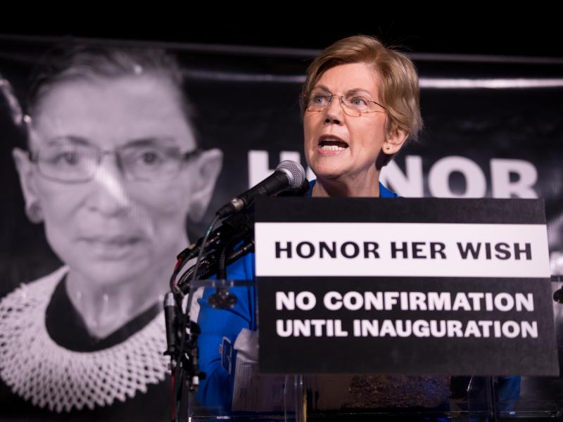 Sen. Elizabeth Warren, D-Mass., rallies the crowd of 2,500 people during a vigil Saturday night for Justice Ruth Bader Ginsburg in Washington, D.C. Sen. Elizabeth Warren, D-Mass., rallies the crowd of 2,500 people during a vigil Saturday night for Justice Ruth Bader Ginsburg in Washington, D.C.