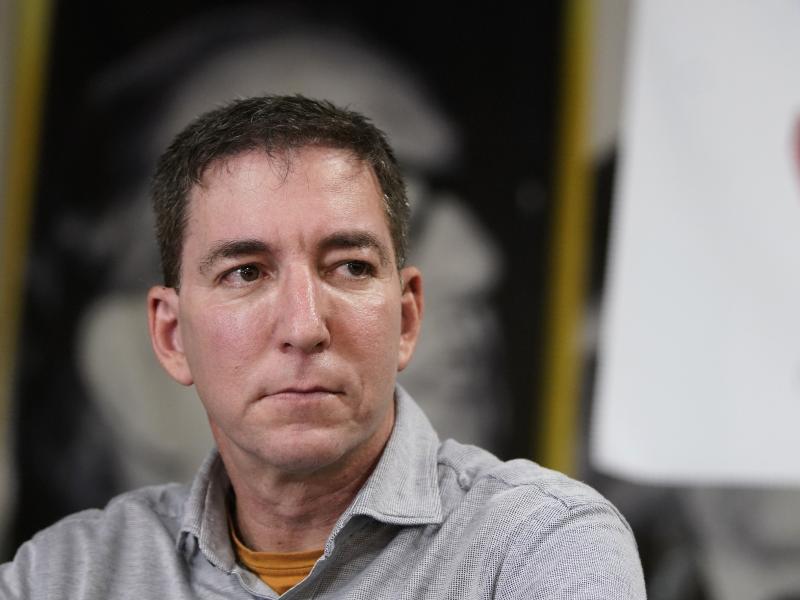 Journalist Glenn Greenwald, shown here during a press conference last July, has been accused by Brazilian federal prosecutors in a hacking probe. Journalist Glenn Greenwald, shown here during a press conference last July, has been accused by Brazilian federal prosecutors in a hacking probe.